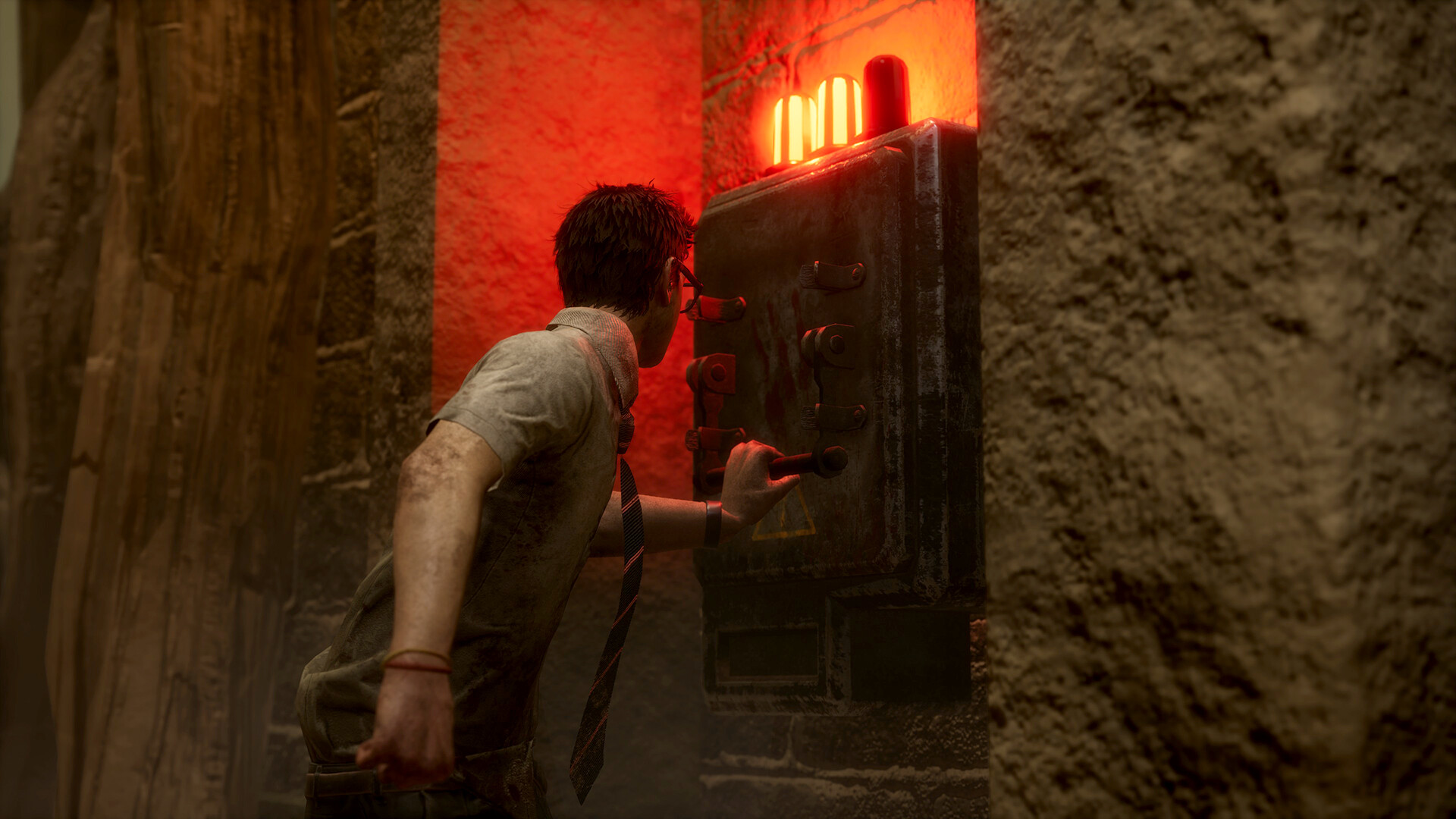 A survivor operates the exit gate switch.