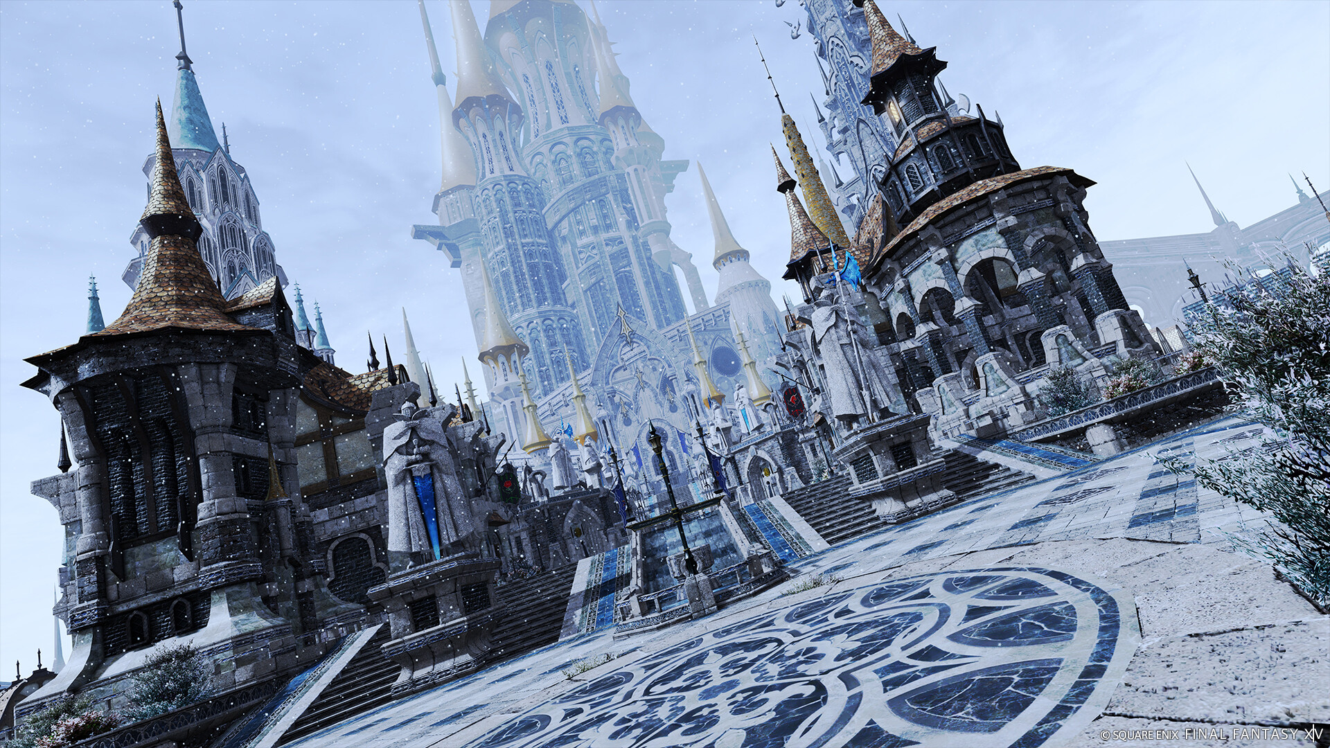 Ośnieżone miasto Ishgard z monumentalną katedrą.