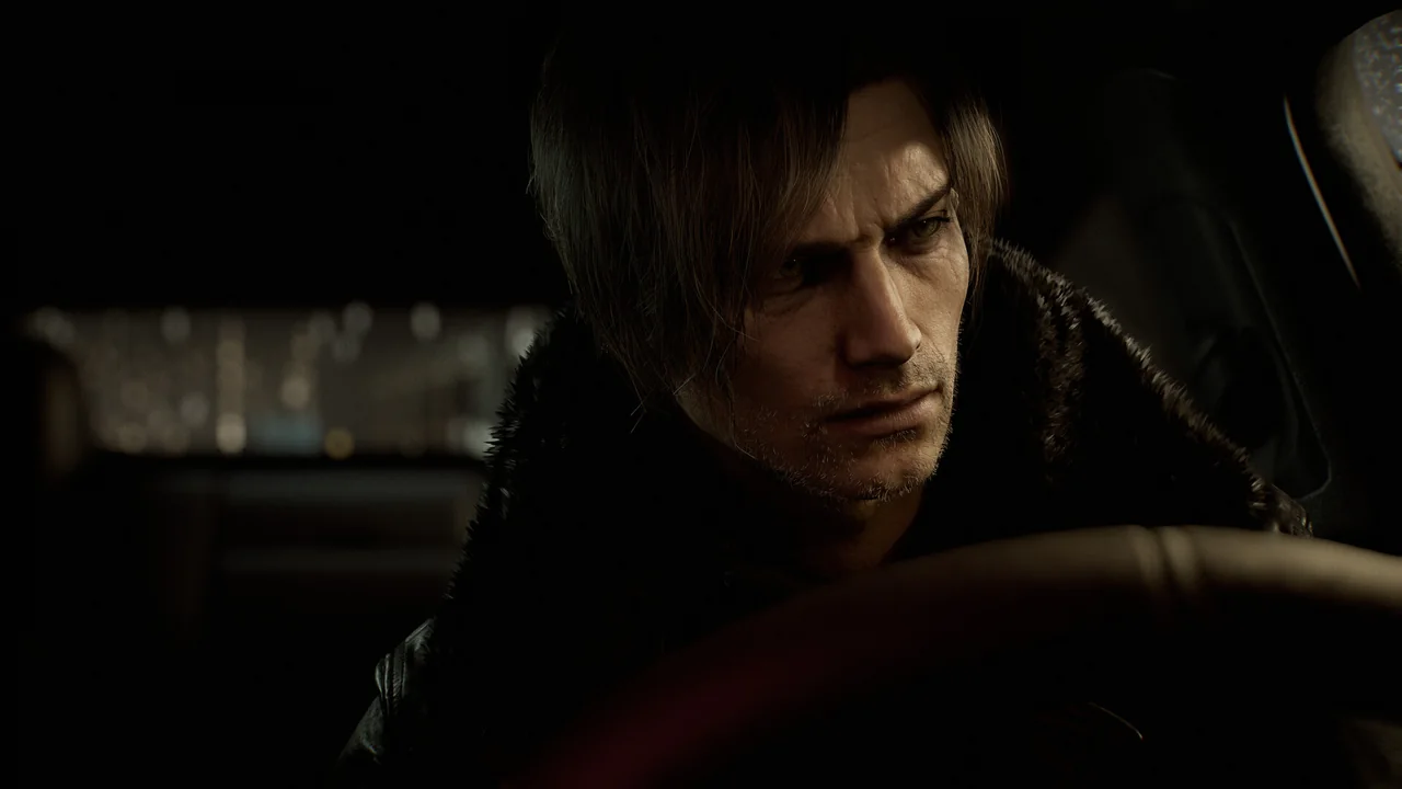 A close-up of an older Leon at the wheel